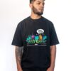 Remera oversize negra con estampa de dibujitos y palabra crew